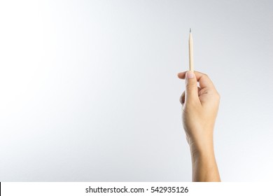 Right Hand Holding A Pencil Isolated On White Background