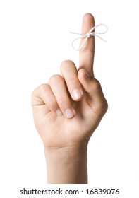 Right Hand With Reminder String Tied To Index Finger Isolated On White