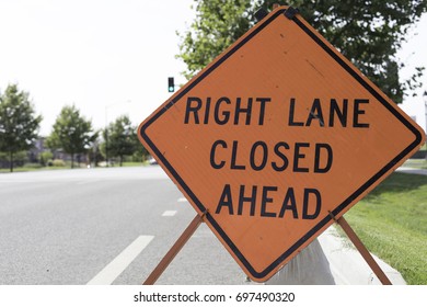 Right Lane Closed Ahead Sign Posted In The Street