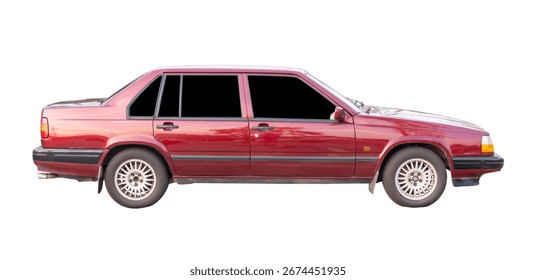 Right side view of old model of red sports sedan car in horizon is isolated on white background with clipping path.