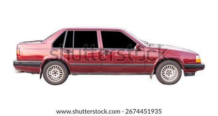 Right side view of old model of red sports sedan car in horizon is isolated on white background with clipping path.