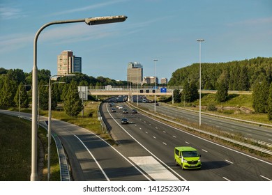 Rijswijk, ZH, Netherlands - May 25 2019: highway A4 with apartment building, Europen Patent Office buildings, bridge 