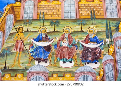 Rila, Bulgaria - June, 25, 2015: Wall painting  of Abraham, Isaac, Jacob at Rila Monastery church. The monastery is the largest in Bulgaria and a UNESCO World Heritage site