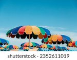 Rimini, Italy - Umbrellas and deck chairs on the beach