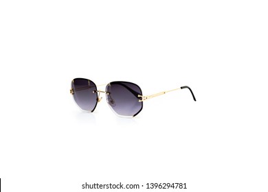 Rimless hexagon and golden thin ear frame black gradient sunglasses at isolated white background  side view