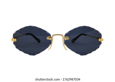 Rimless sunglasses and dark blue rhomboid shaped lenses   gold thin frames isolated white background  Front view 