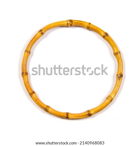 A ring of bamboo on a white background. Natural bamboo close-up.