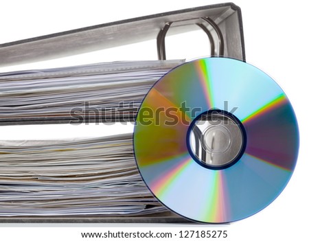 Ring binder with compact disc over white background - digital storage concept