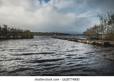 Ring Buoy Standing Alone As The Storm Approaches Conveys Despair, Isolation And Solitude Concept. A Life Preserver Or Life Buoy By Lough Melvin For Rescue And Life Protection - County Leitrim, Ireland