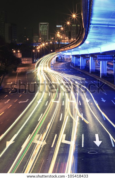 Ring elevated
highway light trails night
scene