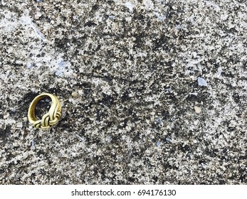 The ring falls to the ground
