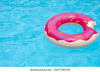 Ring float in swimming pool. Summer background. Summer backdrop. Summertime vacation. Rubber circle. Inflatable swimming ring. - Powered by Shutterstock