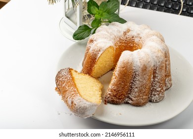 Ring lemon cake. Ciambella, Christmas bundt dessert, traditional pastry babka, easter sponge pie with icing close up