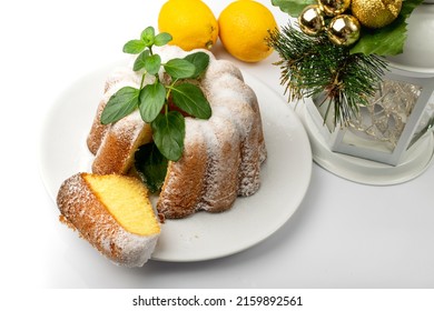 Ring lemon cake. Ciambella, Christmas bundt dessert, traditional pastry babka, easter sponge pie with icing close up