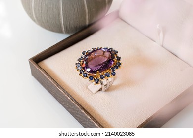 The Ring Is Made Of Amethyst In Box