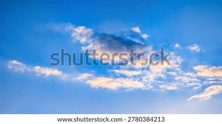 A ring of orange cloud remnants from which all the rain has ceased. A wreath and lonely edges of the cloud's shape. The rain has ended. The end of hope, the emptiness of thoughts, the nirvana of soft meditation.