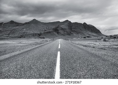 Ring Road In Iceland. Rainy Weather Mountain Landscape. Black And White Toned Image.