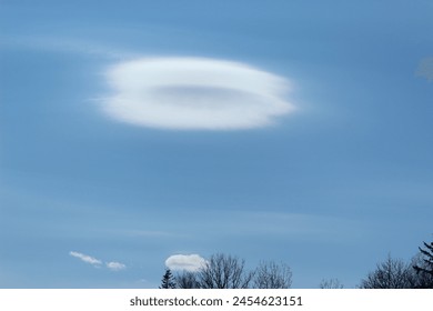 ring shaped cloud hovering in the sky