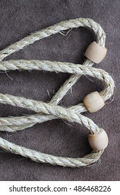 Ring Toss Game. Rope With Wooden Rings , Background Suede 3