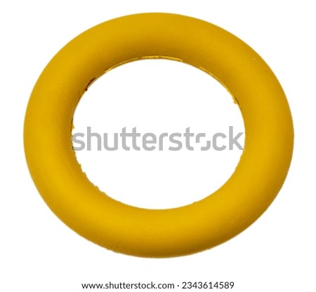 ring toy for dogs, a kind of rubber toy for cleaning the teeth of pets, on a white background.