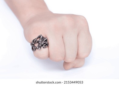 Ring worn on the finger. Awesome metal accessory. Heavy metal stylish attribute. Rock style ring. - Powered by Shutterstock