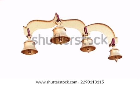 Ringing the old bell in the temple, golden metal old bell isolated on white background.