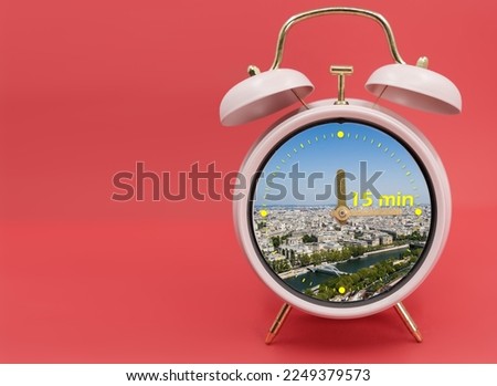 Ringing twin bell vintage classic alarm clock Isolated on red and with the 15 minute city concept.