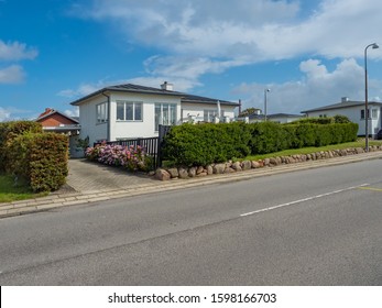 Ringkobing Jutland Denmark - August 17th 2019 - Facade Of A White House With A Garden On A Sunny Summer Afternoon 