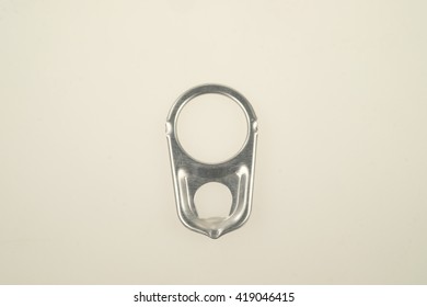 Ring-pulls isolated on a white background.
