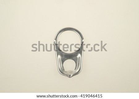 Ring-pulls isolated on a white background.