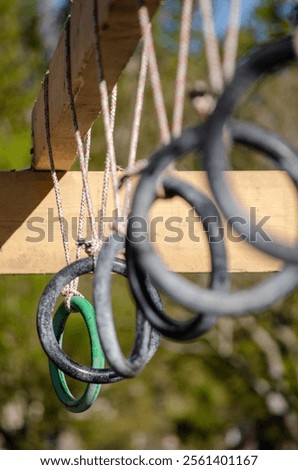 rings hanging from an OCR race obstacle