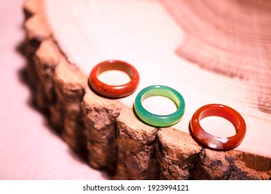 Rings made colored semi  precious stones tree bark  There is space for text 