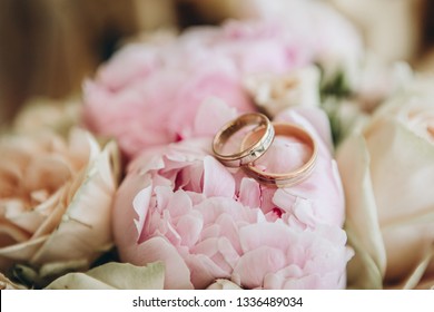 rings wedding symbol bouquet flowers rose and peony