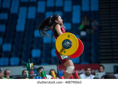Rio, Brazil - April 4, 2016: CAJAS YOMARA (PER) in the female category during the Aquece Rio Weightlifting Test Event at the Arena Carioca 1