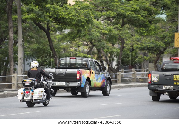 Rio, Brazil - july 17, 2016:  Simulation arrival\
and bus departure in Maracana as will occur at the opening ceremony\
of the Olympic Games and streets are closed in the region. Car\
National Guard.