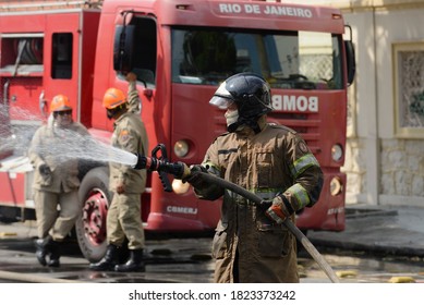 Rio, Brazil - september 28, 2020: fire brigade fighting a fire on bus at city street