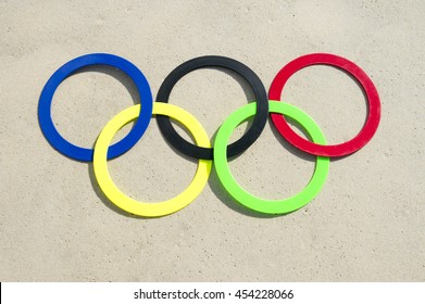 RIO DE JANEIRO - APRIL 4, 2016: Olympic rings rest in the sand on Ipanema Beach in anticipation of the city hosting the 2016 Summer Games.
