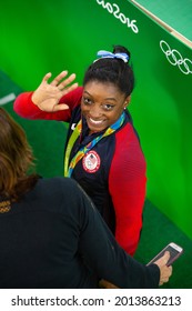 RIO DE JANEIRO - AUGUST 11, 2016: Simon Biles Waves To The Crowd While Doing Interviews After Winning The Gold Medal For The Women's Artistic Individual All-Around In Gymnastics.