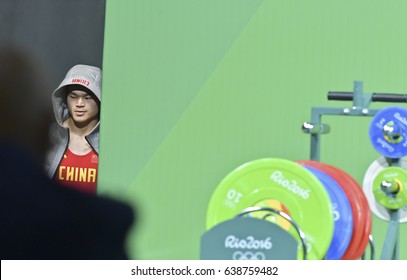 Rio De Janeiro, August 19, 2016: China athlete weightlifting, Shi Zhiyoung, standing behind the stage before starting in the clean and jerk category at the Olympic Games Rio 2016, Brazil.
