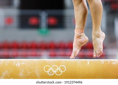 Rio De Janeiro, Brazil 08.04.2016: Balance Beam Artistic Gymnastics At Rio 2016 Olympic Games. Close Up Detail Of Woman Athlete Feet Exercise Training At Indoor Stadium Arena. 