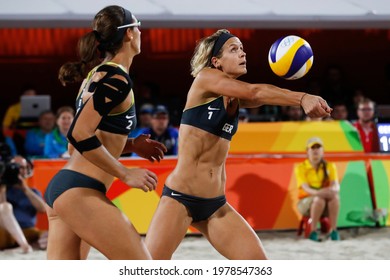 Rio de Janeiro, Brazil 08.17.2016: Laura Ludwig and Kira Walkenhorst of Germany beach volleyball team score gold medal final match at Rio 2016 Olympic Games. German players win over brazilian team.