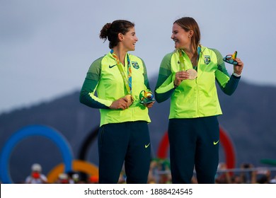 Rio De Janeiro Brazil 08.18.2016: Sailing At The Rio 2016 Olympic Games. Brazilian Sailors Martine Grael And Kahena Kunze Win Gold In The 49er FX Class. Women's Skiff Sail Medalists Podium Celebration