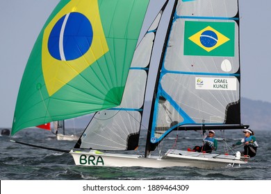 Rio De Janeiro Brazil 08.18.2016: Sailing At Rio 2016 Olympic Games. Brazilian Sailors Martine Grael And Kahena Kunze Win Gold Medal 49er FX Class. Women Skiff Sail Boat Medalists At Guanabara Bay.