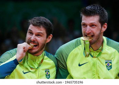 Rio De Janeiro, Brazil 08.21.2016: Brazilian National Volleyball Team Celebrating Gold Medal At Rio 2016 Olympic Games, Maracanazinho Stadium. Bruno Rezende, Bruninho, Eder Carbonera Podium Ceremony 