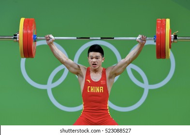 Rio De Janeiro, Brazil, 19 August 2016: China Gold Medal Weightlifting, Shi Zhiyong, playing at Riocentro Pavilion 2, at the Olympic Games Rio 2016, Brazil.