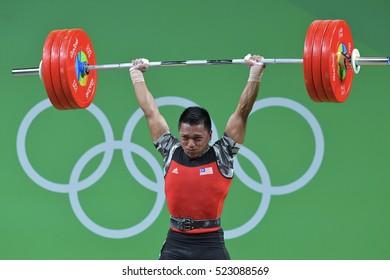 Rio De Janeiro, Brazil, 19 August 2016: Malaysia's Weightlifting, Mohd Hafifi Mansor, lifting in the clean and jerk category when playing at Riocentro Pavilion 2, at the Olympic Games Rio 2016, Brazil