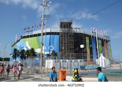 Rio De Janeiro, Brazil - August 04, 2016: View Of The The Olympic Beach Volleyball Arena In Copacabana Beach With Brazilians And Tourists Nearby.