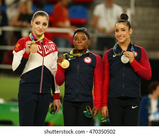 RIO DE JANEIRO, BRAZIL - AUGUST 11, 2016:Women's All-around Gymnastics Winners At Rio 2016 Olympic Games Aliya Mustafina Of Russia (L), Simone Biles Of USA And Aly Raisman Of USA During Medal Ceremony