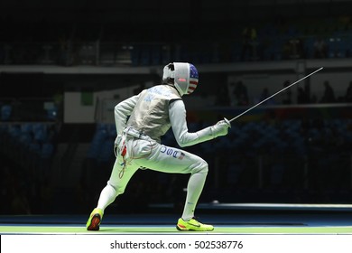 RIO DE JANEIRO, BRAZIL - AUGUST 12, 2016: Fencer Alexander Massialas Of United States Competes In The Men's Team Foil Of The Rio 2016 Olympic Games At The Carioca Arena 3