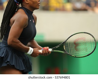 RIO DE JANEIRO, BRAZIL - AUGUST 7, 2016: Olympic champion Serena Williams of United States plays with Wilson racquet during first round match of the Rio 2016 Olympic Games at the Olympic Tennis Centre
